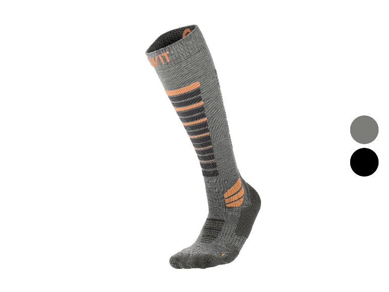 Une seule chaussette de ski grise et orange avec un échantillon de couleur noir et gris.