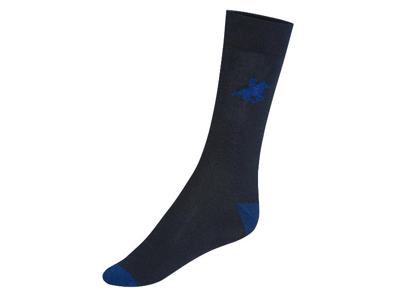 Une chaussette bleu foncé avec un symbole de cheval bleu.