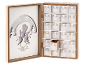 Calendrier de l'Avent de Noël avec motif de cerf et 24 tiroirs numérotés.