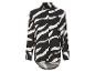 Chemise à manches longues à motif zèbre noir et blanc.