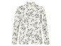 Pull à col roulé blanc à manches longues avec un imprimé floral noir