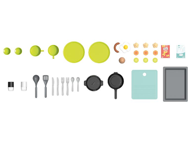 Un ensemble de vaisselle en plastique pour jouer, comprenant des assiettes, des tasses, des casseroles, des couverts et de la nourriture.