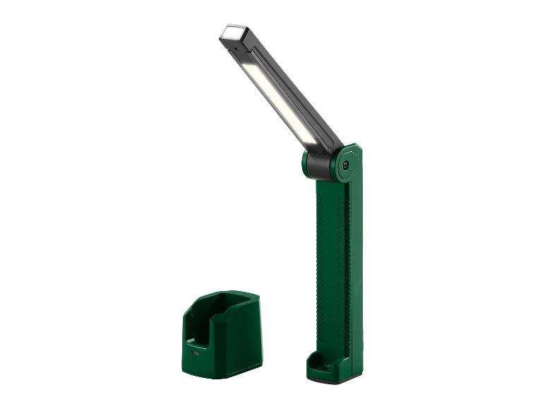 Lampe de poche pliable avec station de charge.