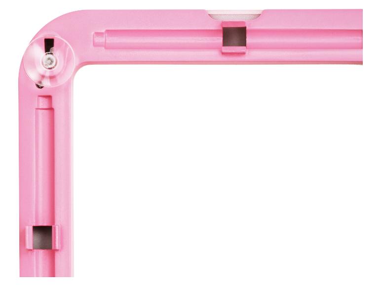 Cadre en plastique rose avec ventouse et rainures sur fond blanc.