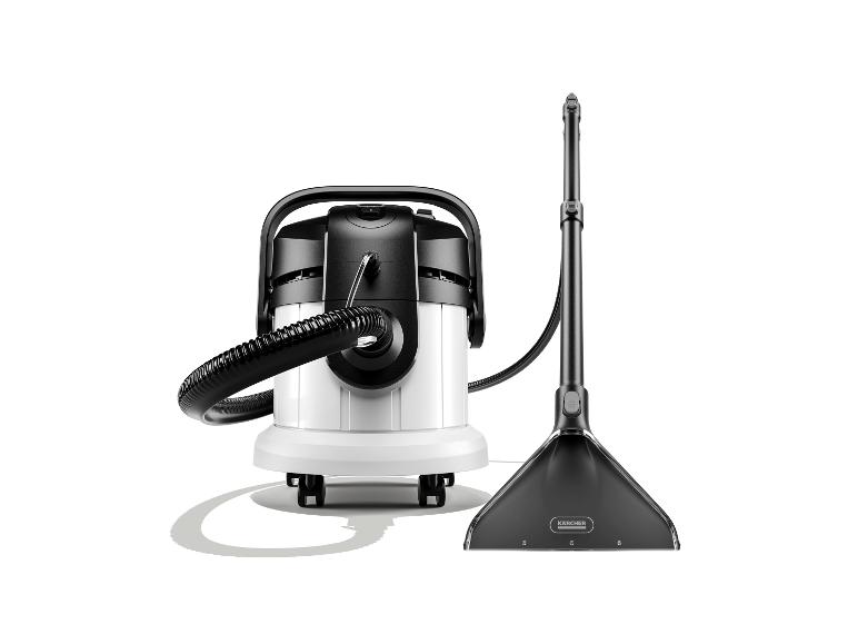 Un aspirateur eau et poussière blanc et noir avec une buse de sol.