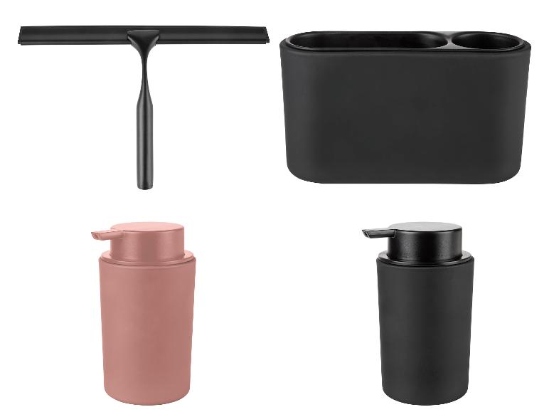 Accessoires de salle de bain noirs, incluant une raclette, un porte-brosses à dents et des distributeurs de savon noirs et or rose.