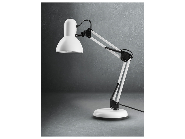 Une lampe de bureau blanche avec un bras réglable.