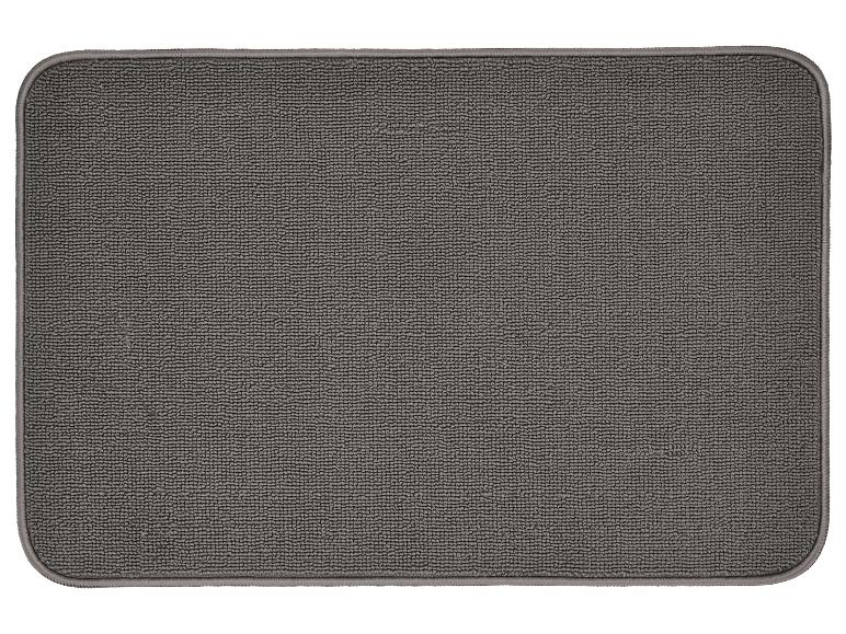 Paillasson rectangulaire gris avec coins arrondis et bordure.