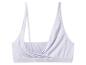 Soutien-gorge de sport blanc à fines bretelles et design croisé sur le devant.
