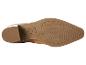 La semelle d'une chaussure Esmara marron avec une semelle rainurée.
