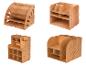 Quatre organisateurs en bois pour articles de bureau.