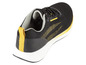 Sneakers noires avec des accents jaunes
