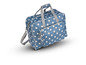 Un sac de voyage bleu à pois blancs.