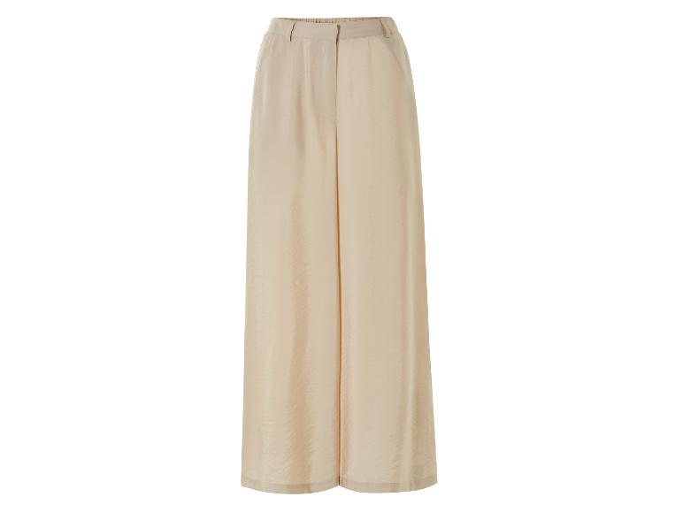 Pantalon large beige élégant.
