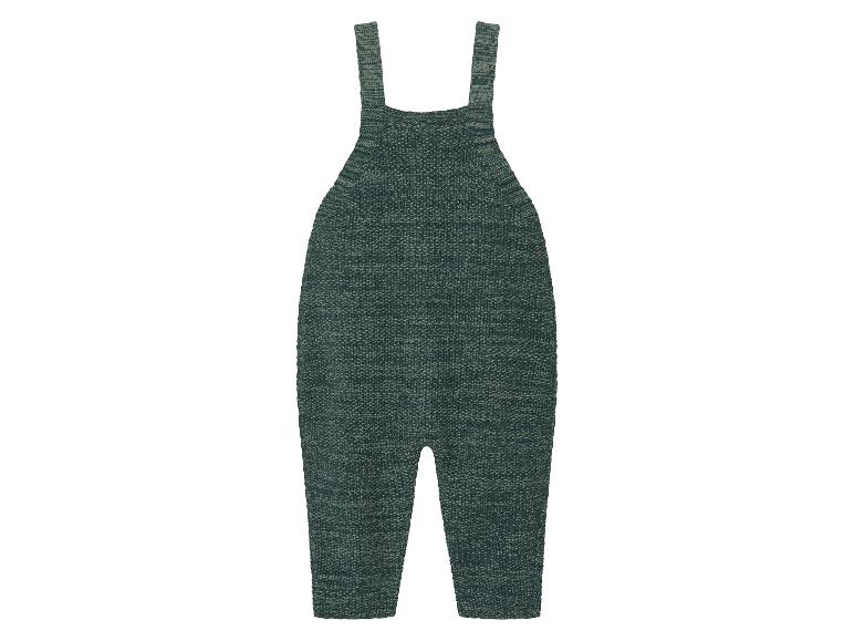 Une combinaison en tricot vert foncé pour bébé.