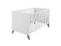 Lit bébé blanc avec pieds en bois