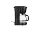 Une cafetière noire avec une carafe en verre.