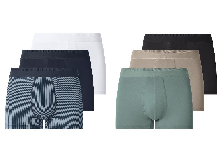 Caleçons boxeurs pour hommes en blanc, noir, rayé, beige et vert.