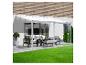 Pergola blanche avec salon de jardin et pelouse verte