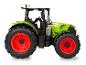 Tracteur jouet Claas Arion 660 avec toit blanc et roues rouges.