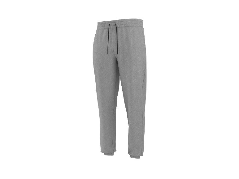 Pantalon de survêtement gris pour homme avec cordon de serrage à la taille.