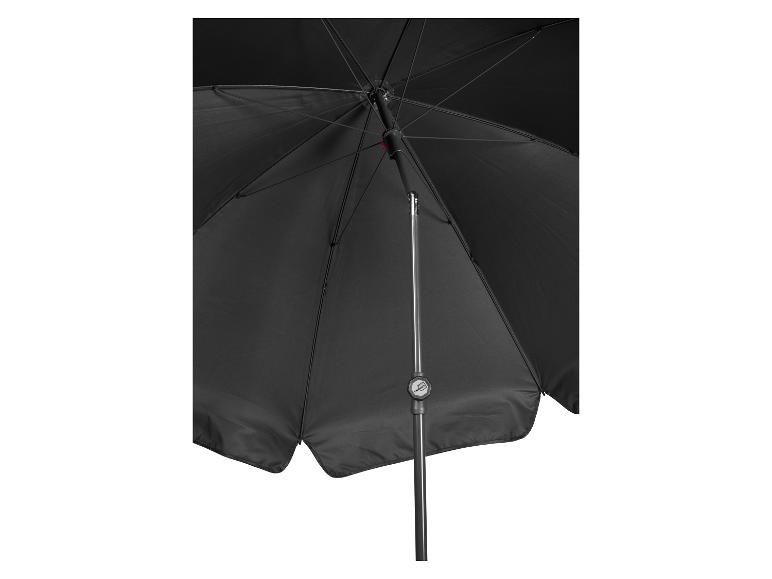Parasol noir vu d'en bas avec baleines et mât visibles