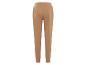 Pantalon de survêtement beige avec ceinture élastique.