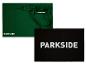 Deux tapis Parkside ; un vert avec une image d'une perceuse, un noir avec du texte blanc.