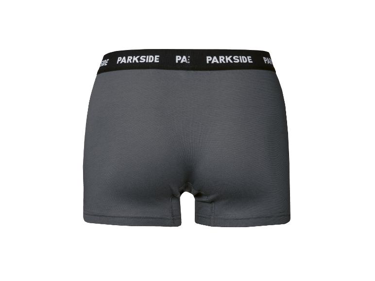 Caleçon gris pour homme avec ceinture noire et inscription blanche.