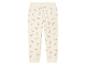 Pantalon de jogging blanc avec un motif d'arc-en-ciel.