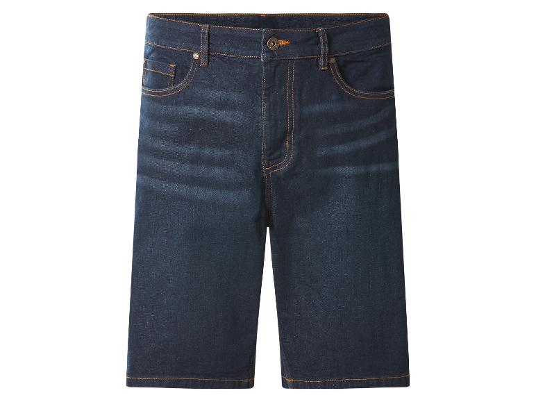 Short en jean bleu foncé avec surpiqûres oranges et détails métalliques.