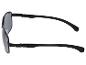 Lunettes de soleil noires avec verres foncés, prises de côté.