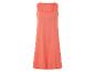 Robe midi corail sans manches, style minimaliste.