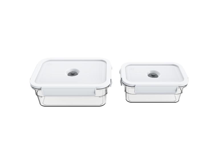 Deux récipients sous vide rectangulaires transparents avec couvercles blancs