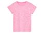 T-shirt rose à pois blancs pour enfant.