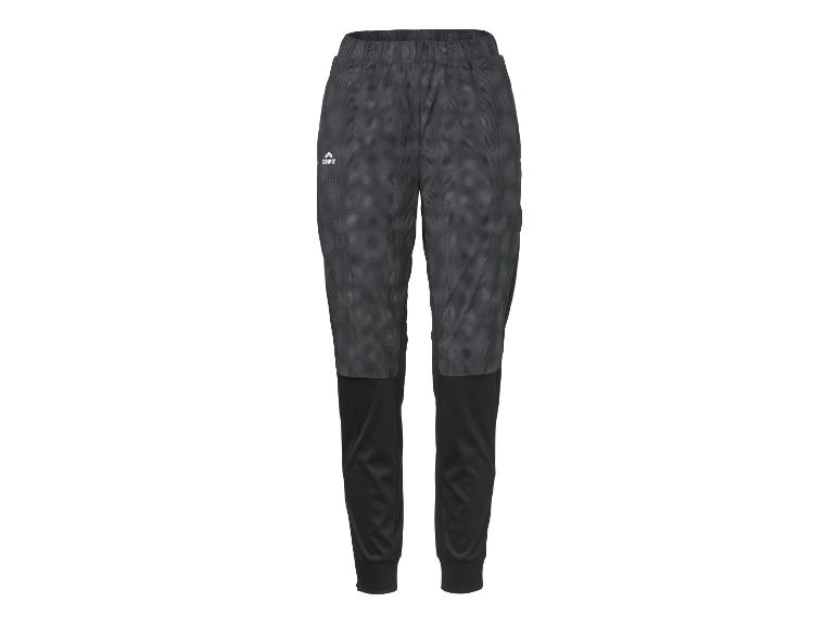 Pantalon de sport noir et gris avec motif, taille élastique et chevilles resserrées.