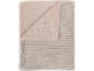 Couverture beige en sherpa et velours côtelé.
