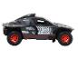 Un modèle de rallye Audi e-tron gris avec des jantes rouges.
