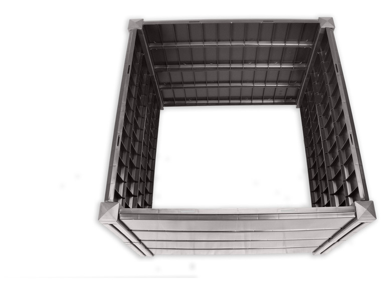 Un composteur en plastique noir ouvert.
