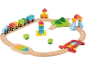 Ensemble de train en bois avec wagons colorés, rails, pont et blocs de construction.