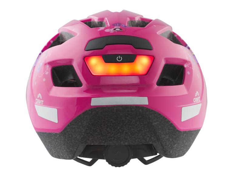 Casque de vélo rose pour enfant avec feu arrière allumé