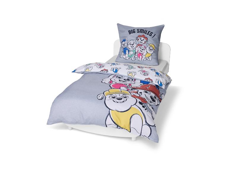 Parure de lit enfant avec oreiller et couette à motifs de chiots et le texte « BIG SMILES ! ».