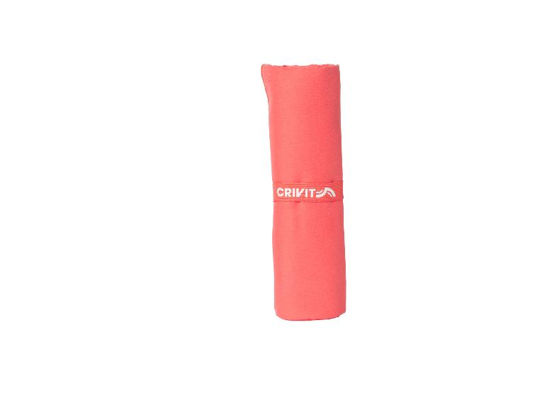 Serviette de sport Crivit rose roulé.