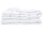 Couette blanche pliée avec surpiqûres matelassées