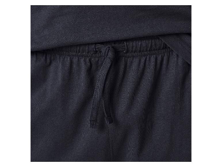 Gros plan d'un pantalon de survêtement bleu foncé avec cordon de serrage à la taille