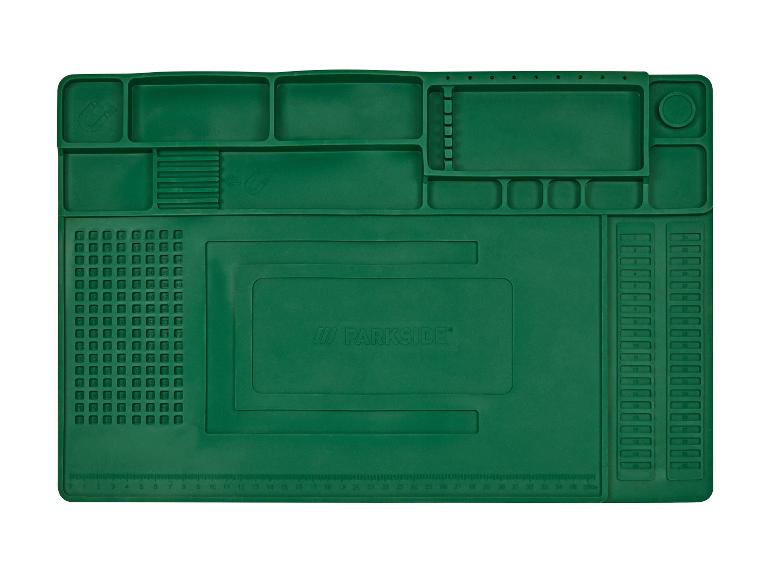 Tapis de travail vert Parkside avec compartiments et règle.