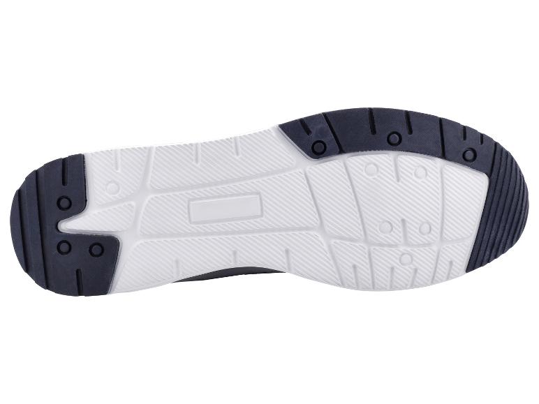 Semelle de chaussure de sport blanche et noire avec motif antidérapant