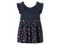 Robe bébé bleu marine avec manches à volants et imprimé fraises sur la jupe.