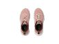 Une paire de baskets roses Crivit.