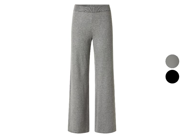 Pantalon large gris en jersey avec taille élastique, également disponible en noir.